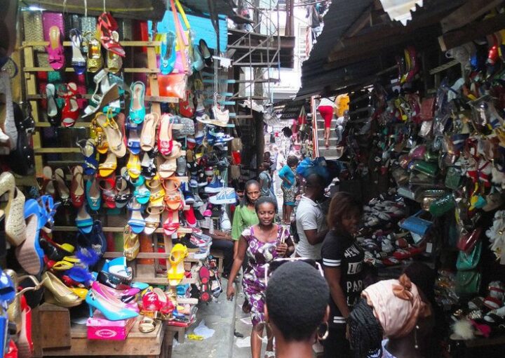A lady enjoying the vibrant street view in Lagos, showcasing one of the fun places to explore in the city